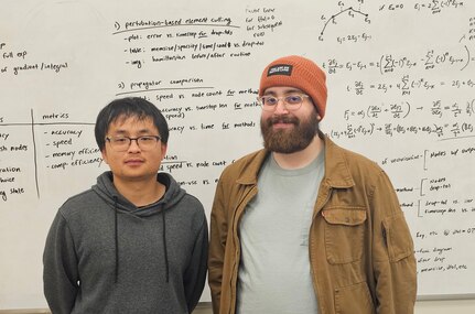 University of California, Riverside (UCR), students Yuan Chen (left) and Simon Sandhofer, study the use of quantum control algorithms as part of the Naval Engineering Education Consortium.