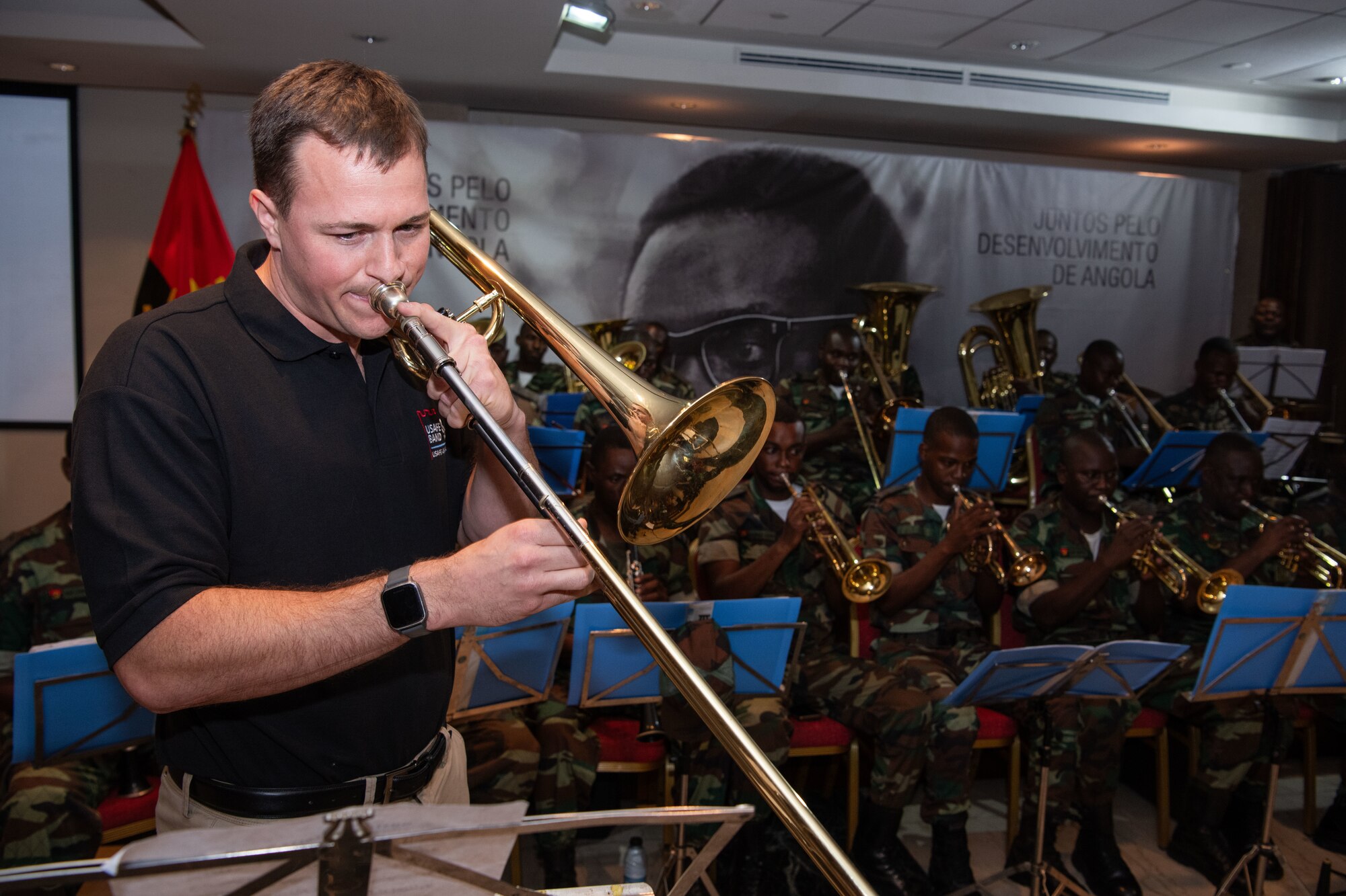 Staff Sgt. Brian Logan, assigned to the U.S. Air Forces in Europe and Air Forces Africa (USAFE-AFAFRICA) Band’s Five Star Brass, plays the trombone during a rehearsal at the Dr. Antonio Agostinho Neto Memorial in Luanda, Angola