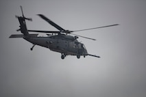 An HH-60W Jolly Green II helicopter piloted by U.S. Air Force Col. Paul Sheets flies toward Avon Park Air Force Range, Florida during Mosaic Tiger 24-1 at Moody Air Force Base, Georgia, Nov. 16, 2023. During Mosaic Tiger 24-1, Avon Park Air Force Range acted as a simulated contingency location. (U.S. Air Force photo by Staff Sgt. Thomas Johns)