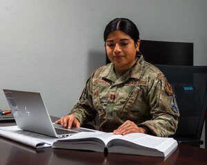 Capt. Rina Hernandez, Victims’ Counsel, reviews legal documents at Minot Air Force Base, North Dakota, Nov. 11, 2023. The Victims’ Counsel is an agency independent of Minot Air Force Base’s chain of command, offering advice and advocacy through independent representation to sexual assault victims. (U.S. Air Force Photo by Senior Airman Evan Lichtenhan)