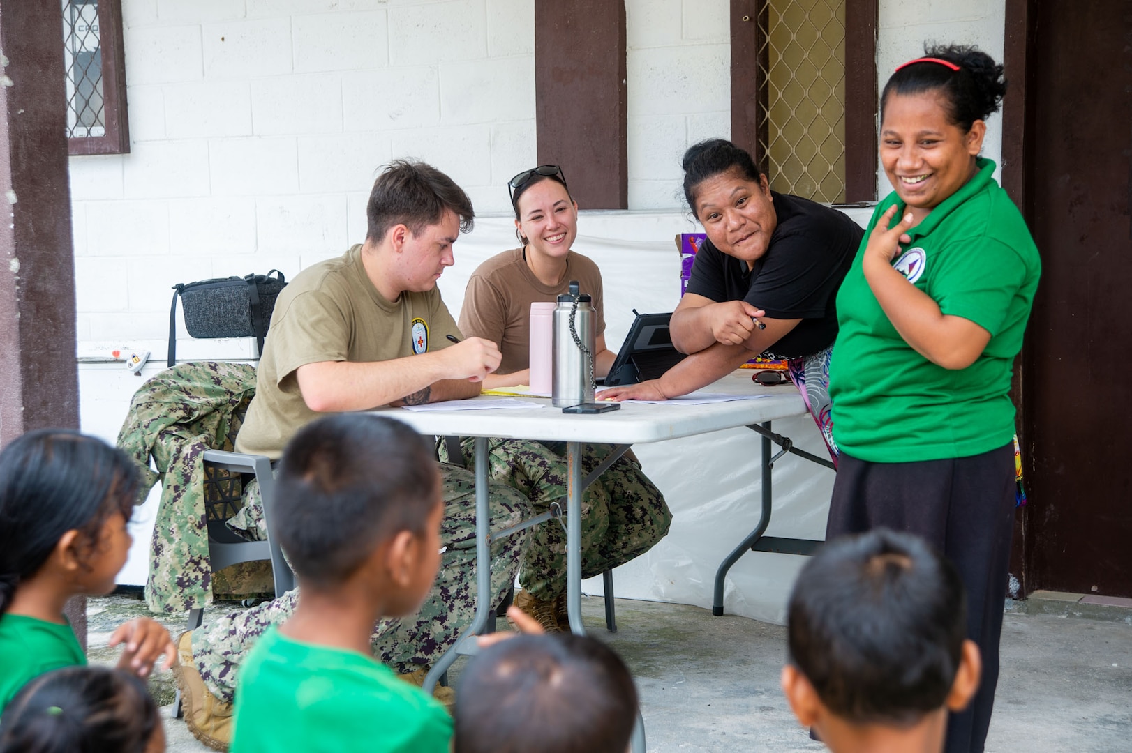 U.S. Navy Lt. j.g. Shae Thomson, left, and Hospitalman Noah Bates, from Des Moines, Iowa, check in Marshallese patients during medical and dental clinics in Aur Atoll, Republic of the Marshall Islands, in support of Pacific Partnership 2024-1 Nov. 10, 2023. Now in its 19th iteration, Pacific Partnership is the largest annual multinational humanitarian assistance and disaster relief preparedness mission conducted in the Indo-Pacific. (U.S. Navy photo by Mass Communication Specialist 2nd Class Jacob Woitzel)