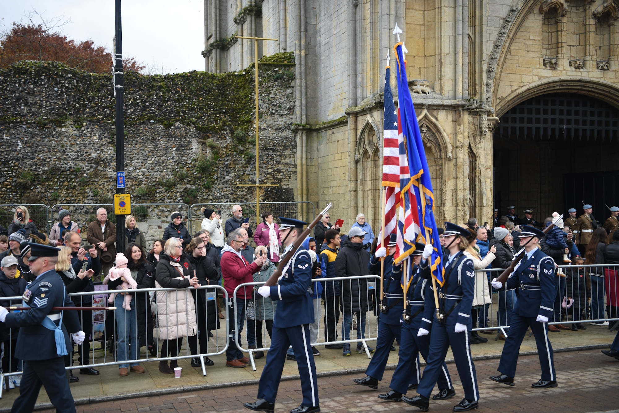 The U.S. Air Force Honor Guard marched in formation during a remembrance ceremony parade at Bury St. Edmunds, England, November 12, 2023.