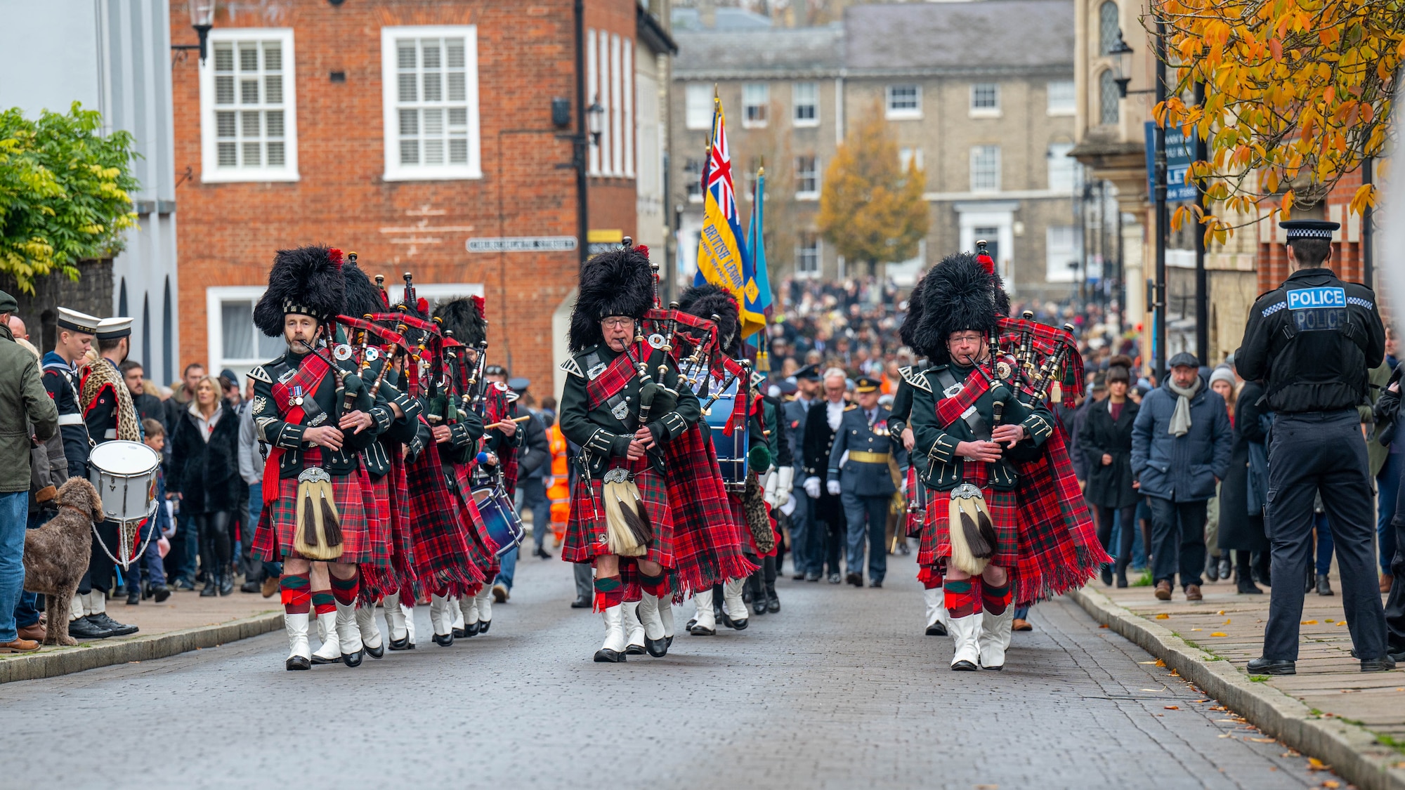 Members of the Glenmoriston Pipe Band  march in a Remembrance Day parade in Bury St. Edmunds, England, Nov. 12, 2023. The day honored the service and sacrifice of Armed Forces, British and Commonwealth veterans, as well as the allies that fought alongside them in the two World Wars and later conflicts. (U.S. Air Force photo by Airman 1st Class Seleena Muhammad-Ali)