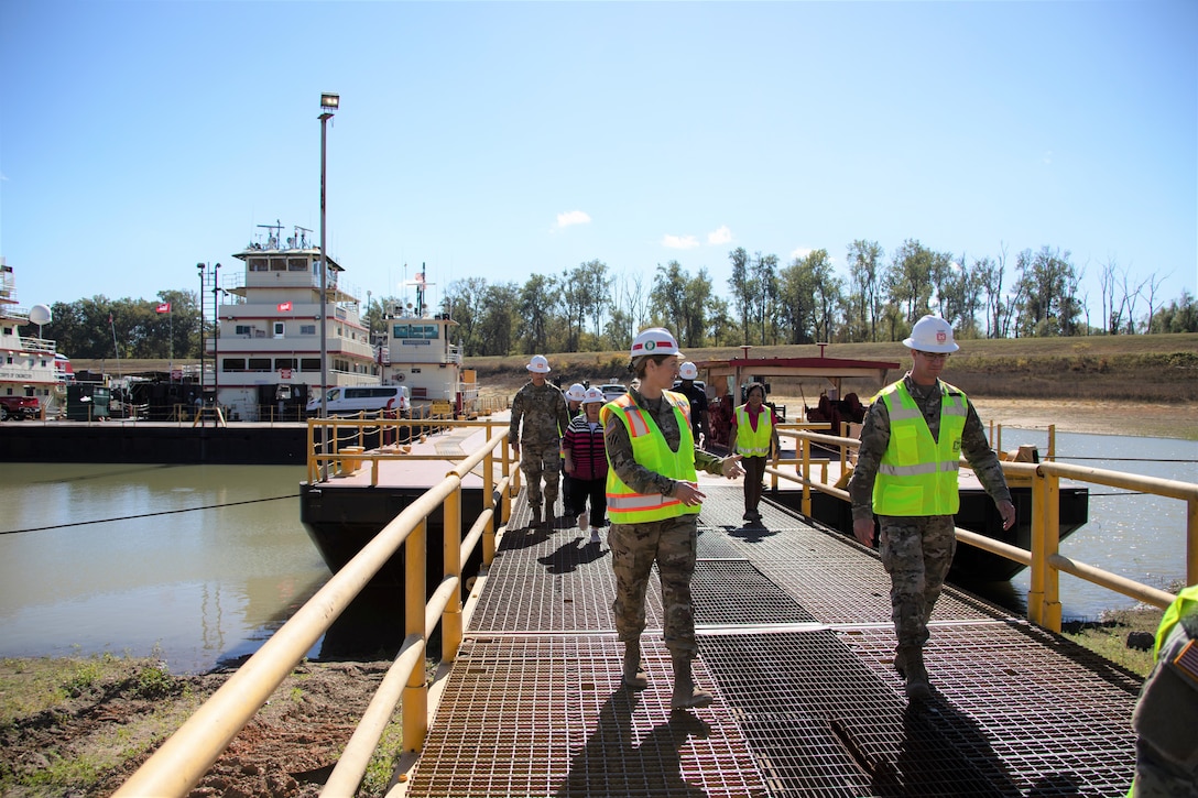 Soldiers walking off boat