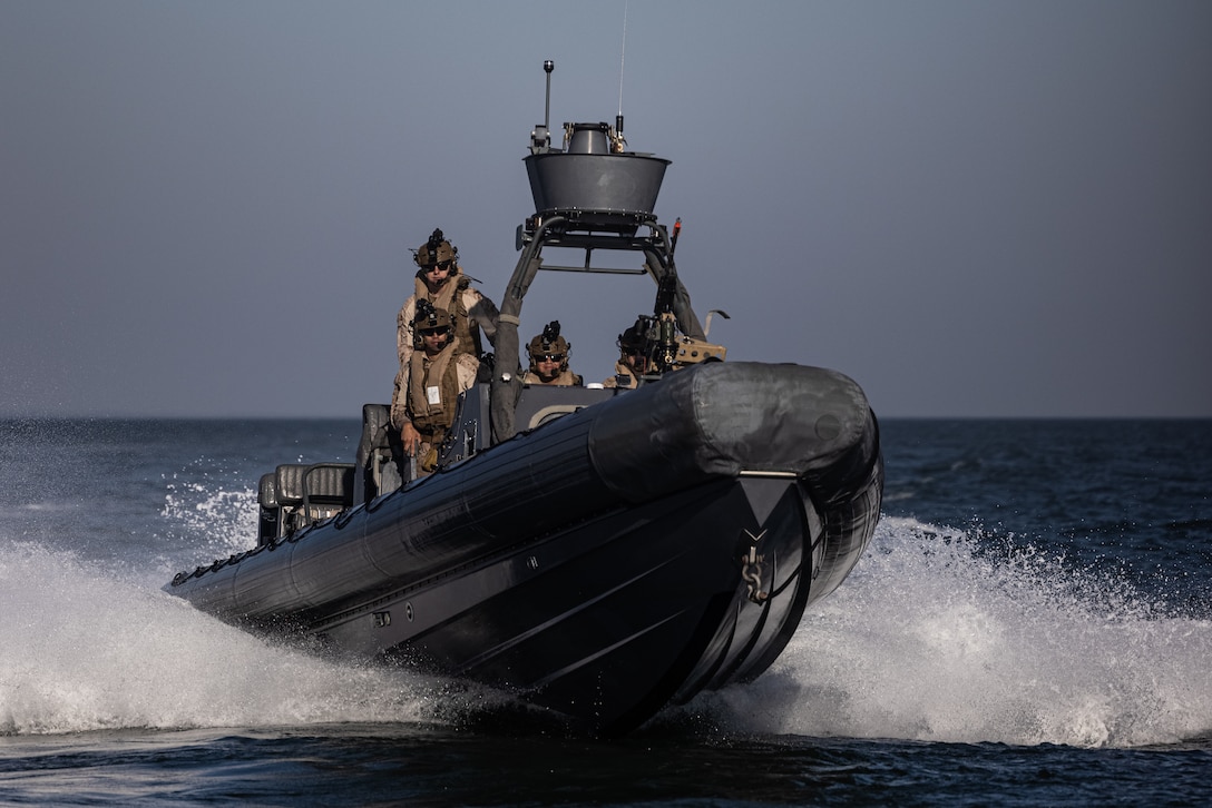 U.S. Marines with Battalion Landing Team 1/8, 24th Marine Expeditionary Unit operate a rigid-hull inflatable boat during visit, board, search and seizure training in the Chesapeake Bay, off the coast of Virginia, Oct. 30, 2023. The VBSS course teaches Marines with MSPF and Battalion Landing Team 1/8 how to properly conduct vessel boarding procedures and maritime interdiction operations while underway with the 24th MEU.