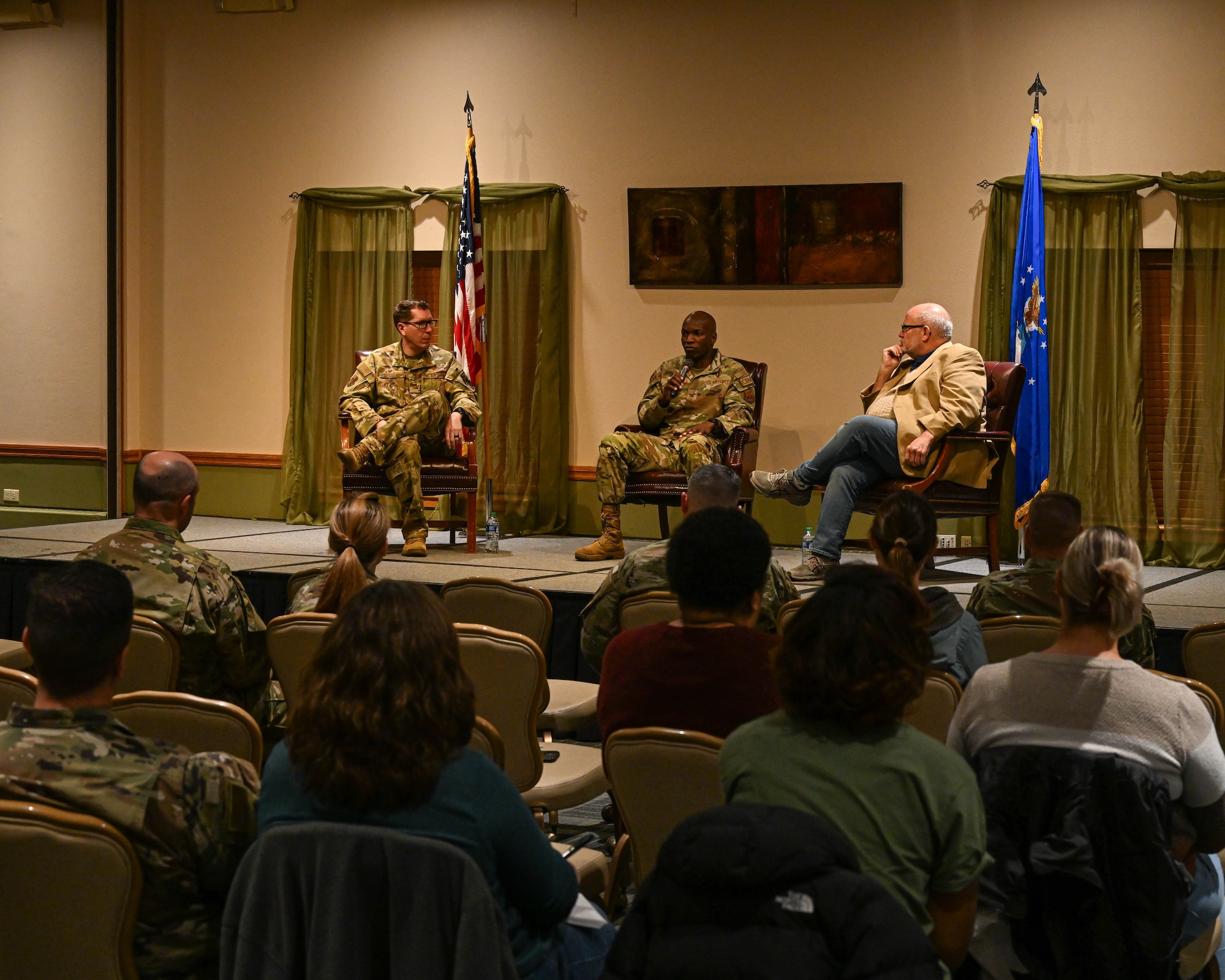 U.S. Air Force Col. Kenneth McGhee, 91st Missile Wing commander (center), gives remarks during a town hall meeting at Minot Air Force Base, North Dakota, Nov. 15, 2023. The town hall meeting provided members of the local community with the opportunity to ask questions to Team Minot leadership and the mayor of Minot. (U.S. Air Force photo by Airman 1st Class Kyle Wilson)