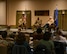 U.S. Air Force Col. Kenneth McGhee, 91st Missile Wing commander (center), gives remarks during a town hall meeting at Minot Air Force Base, North Dakota, Nov. 15, 2023. The town hall meeting provided members of the local community with the opportunity to ask questions to Team Minot leadership and the mayor of Minot. (U.S. Air Force photo by Airman 1st Class Kyle Wilson)