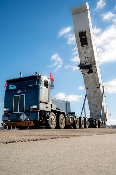 A Transporter Erector retracts during a training exercise at Minot Air Force Base, North Dakota, Nov. 16, 2023. The Transporter Erector is used to lower the Minute Man III, into one of many missile silos around Minot AFB’s area of responsibility. (U.S. Air Force photo by Airman 1st Class Alexander Nottingham)