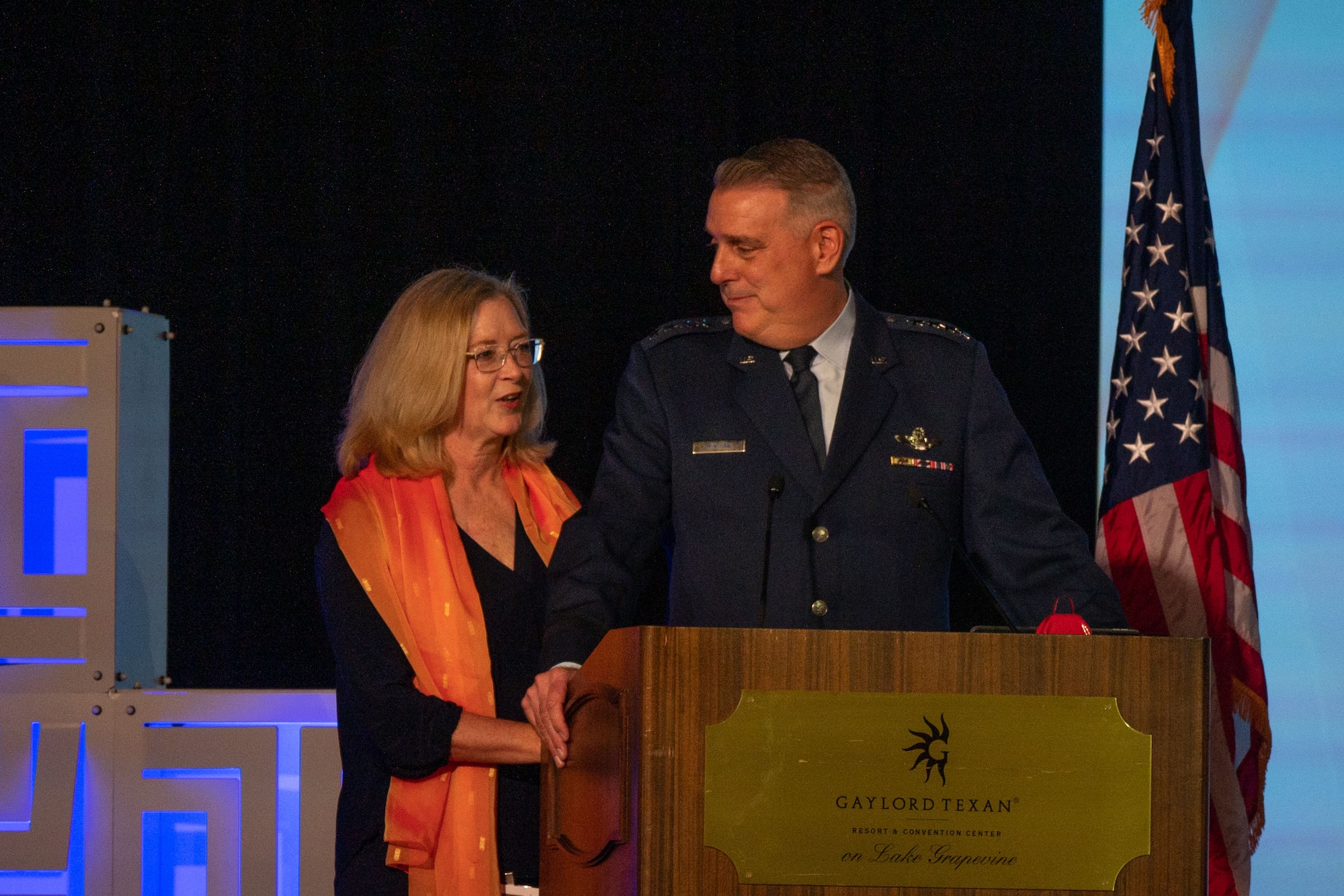 Gen. Mike Minihan and his wife, Ashley, introduce Dr. Kimberly Dickman, U.S. Air Force Academy’s Center for Character and Leadership Development assistant professor during the 55th Annual Airlift/Tanker Association Convention, Nov. 11, 2023, in Grapevine, Texas. This year’s conference featured ten keynote speakers and 20 seminars centering on forging mobility warriors that effectively project the Joint Force and America’s lethality. Additionally, 70 industry partners proposed 89 solutions to AMC leadership, aiming to advance mobility capabilities and eliminate mobility gaps.