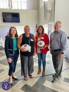 Hampton Roads, Virginia- Ms. Lisa Radocha with “Teammates of the Day” at the Virginia Talent Pipeline Project 2023-2024 Orientation/Kick-Off event.