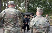 Joint Base Charleston leadership greet Ukrainian defenders as they emerge from a vehicle