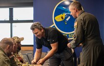 U.S. and Ukrainian military members trade patches between each other