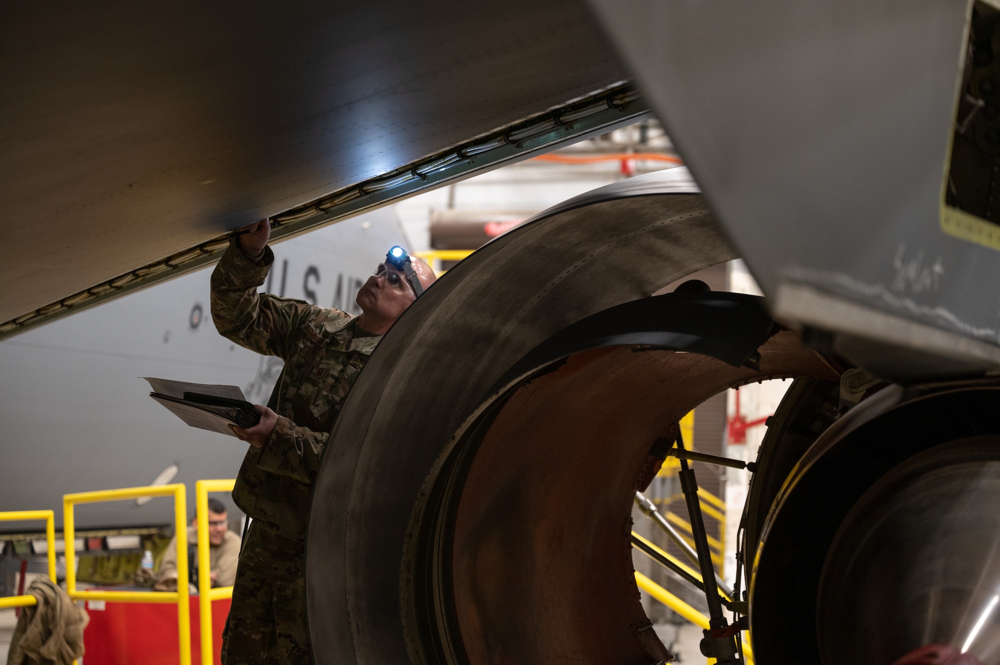 Master Sgt. Brian Remington, 434th Maintenance Squadron fuel systems specialist, examines the fuel lines on a KC-135R Stratotanker during the plane’s periodic inspection at Grissom Air Reserve Base, Ind., Nov. 8, 2023.