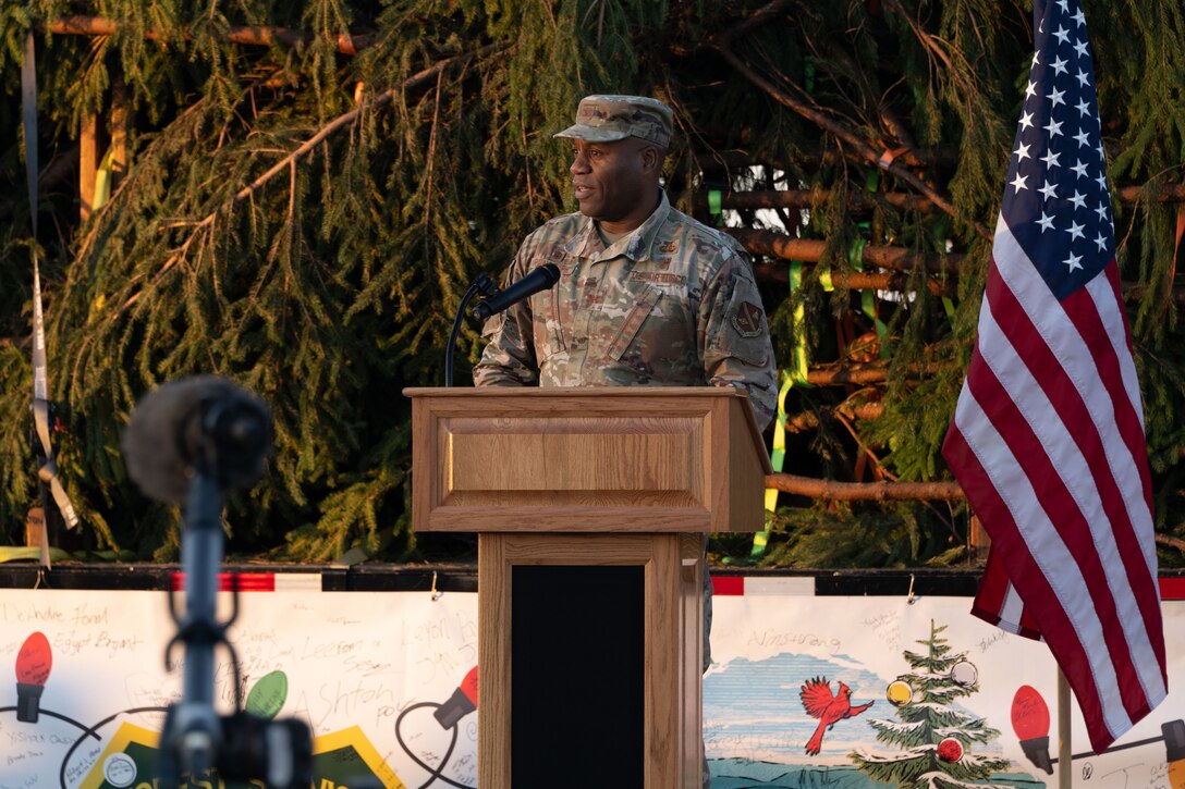 U.S. Air Force Col. Todd Randolph, 316th Wing and Joint Base Andrews installation commander, speaks at the Capitol Christmas Tree celebration at Joint Base Andrews, Md., Nov. 16, 2023. During the event, service members and families viewed the Capitol Christmas Tree, signed the truck banner, and participated in arts and crafts. (U.S. Air Force photo by Airman 1st Class Gianluca Ciccopiedi)
