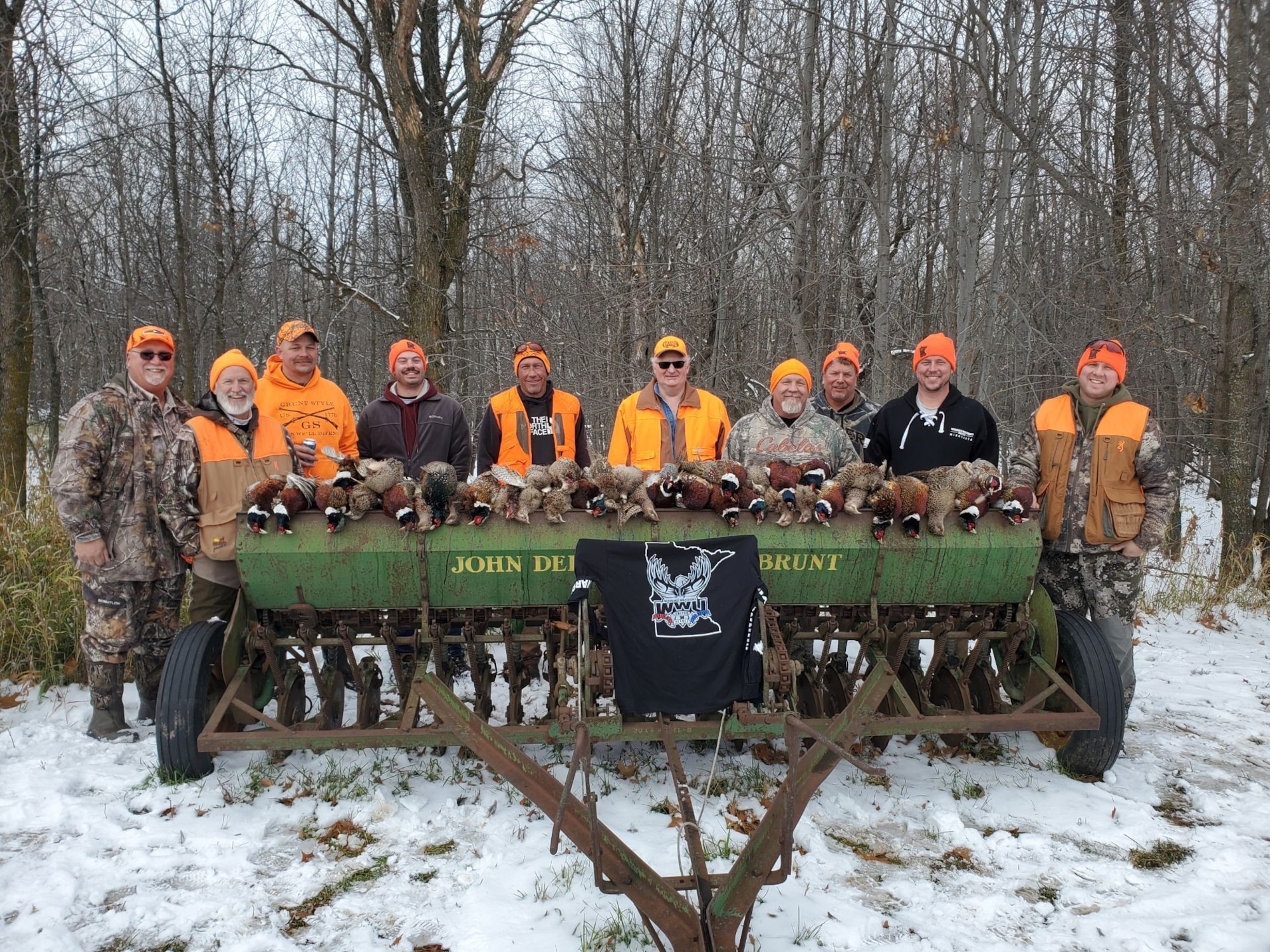 A group of Minnesota Veterans pose for a photo during a pheasant hunting trip in Pierz, Minnesota, planned and paid for by Wounded Warriors United – Minnesota. Wounded Warriors United – Minnesota is a 501C3 non-profit organization that takes wounded and combat veterans living in Minnesota on fully-funded, outdoor hunting, fishing, and camping adventures. The organization was founded by Aircraft Armament Systems Specialist, Tech. Sgt. Logan Shiflett, assigned 148th Fighter Wing, Minnesota Air National Guard, Duluth, Minnesota. (courtesy photo)