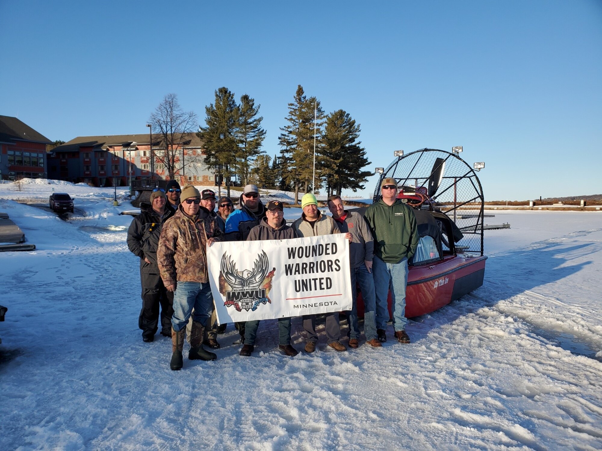 A group of Minnesota Veterans pose for a photo during a Lake Superior ice fishing trip in Duluth, Minnesota, that was planned and paid for by Wounded Warriors United – Minnesota. Wounded Warriors United – Minnesota is a 501C3 non-profit organization that takes wounded and combat veterans living in Minnesota on fully-funded, outdoor hunting, fishing, and camping adventures. The organization was founded by Aircraft Armament Systems Specialist, Tech. Sgt. Logan Shiflett, assigned 148th Fighter Wing, Minnesota Air National Guard, Duluth, Minnesota. (courtesy photo)
