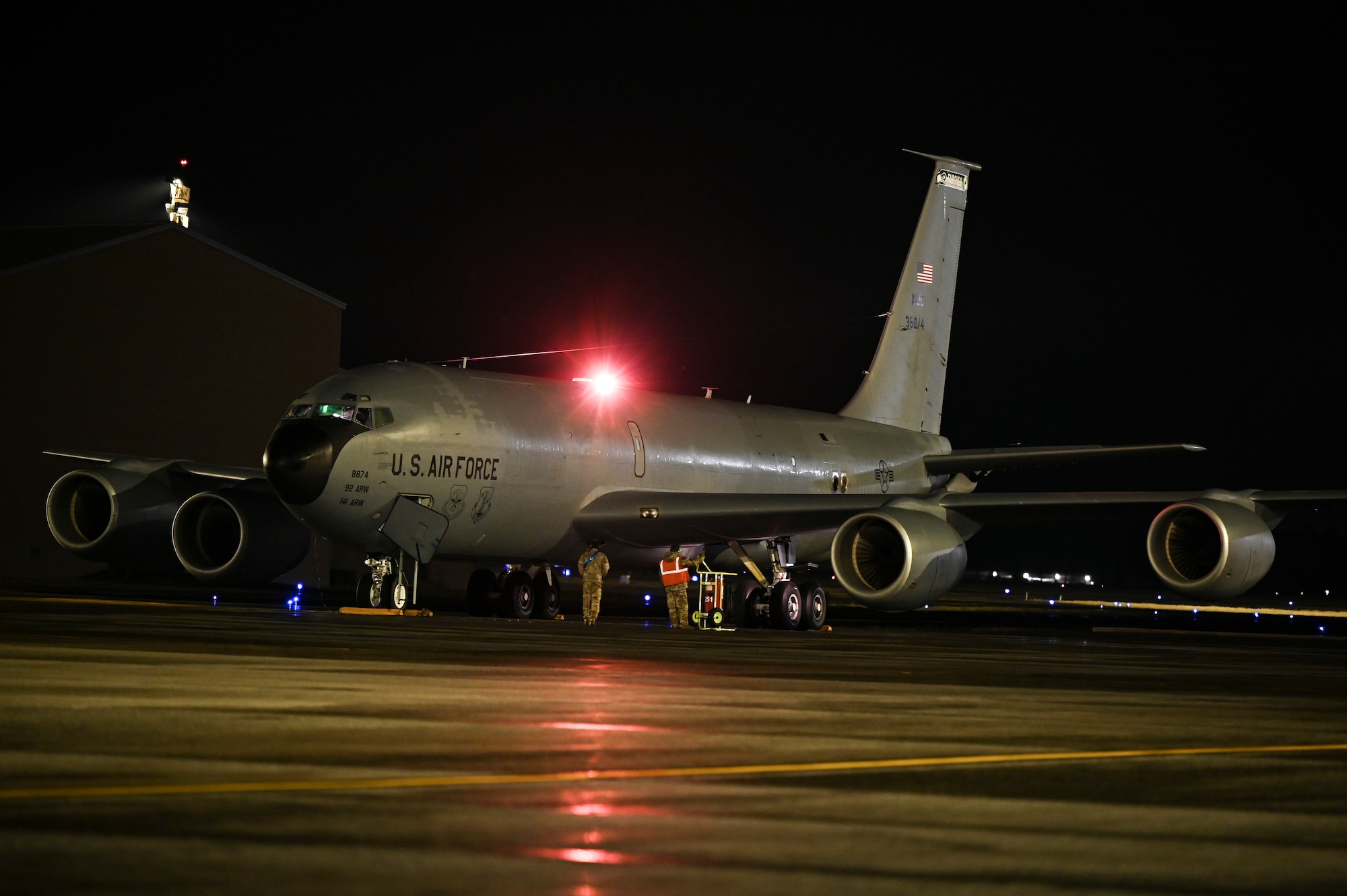 KC-135 on a flight line at night