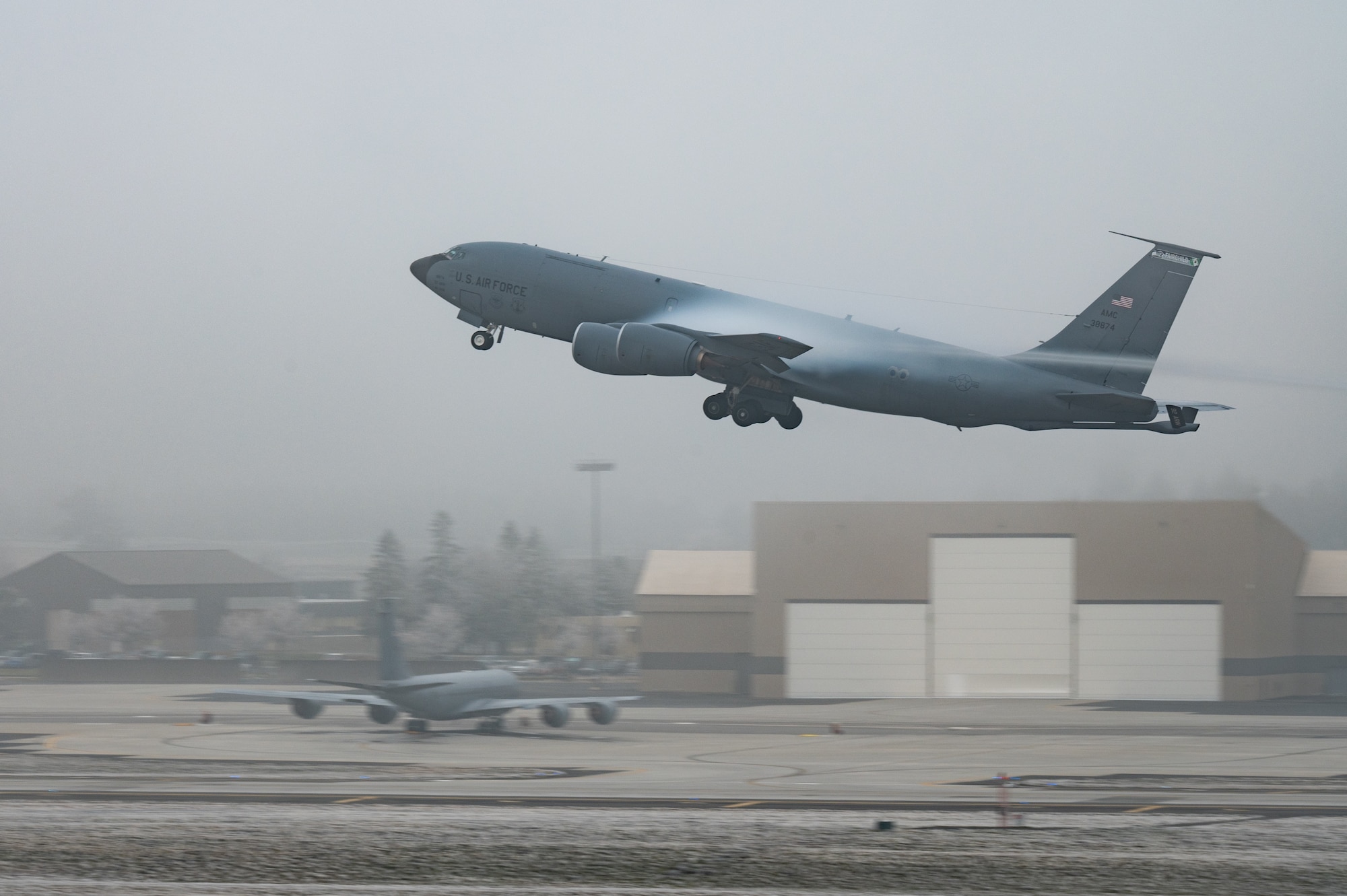KC-135 takes off from flight line