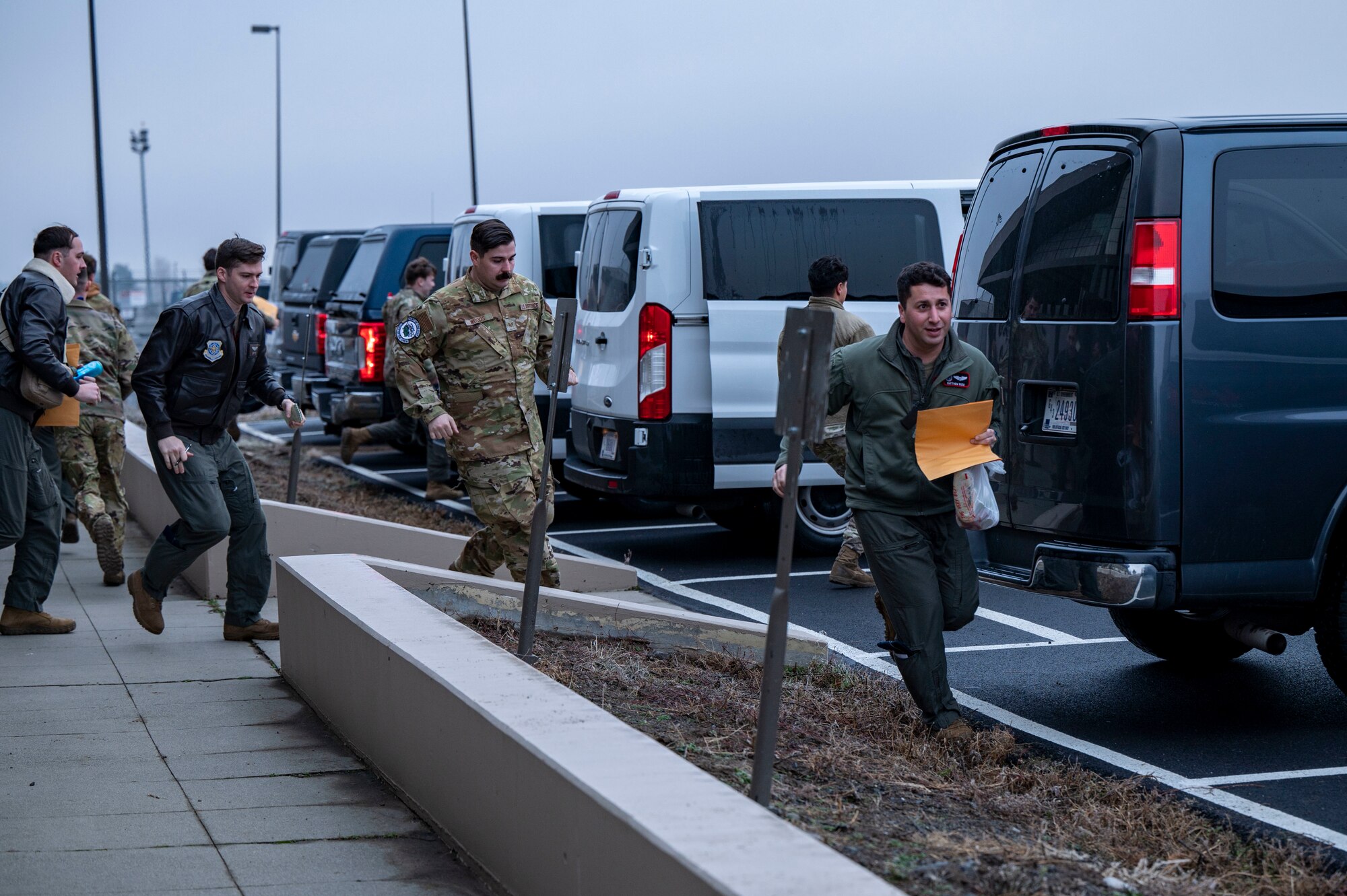 Airmen run to trucks