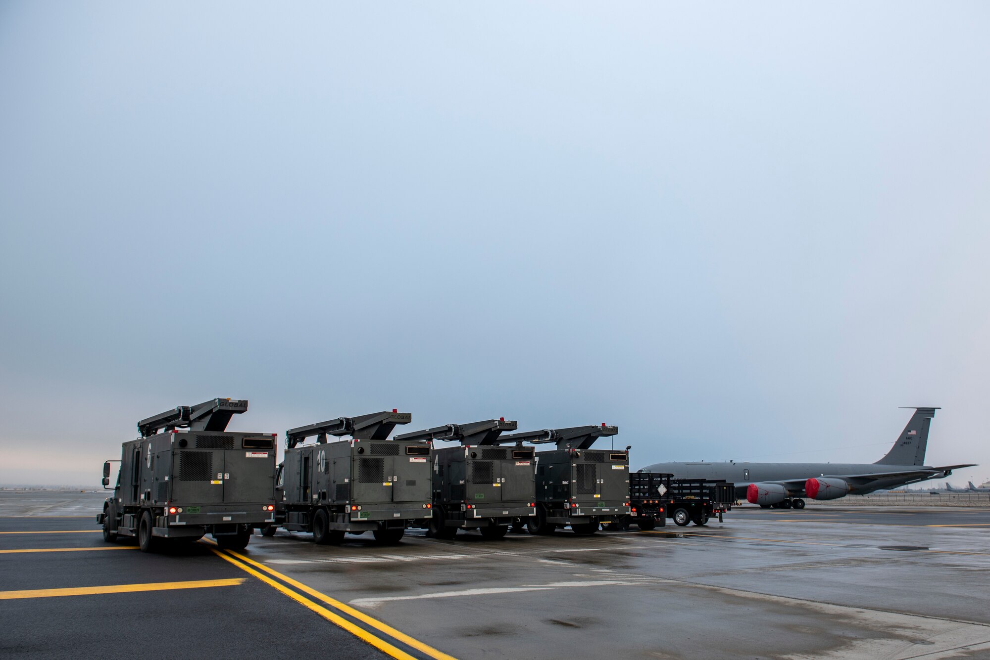 Deicing vehicles parked on flightline