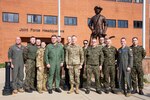 Photo of American and Polish Air Force members discussion.
