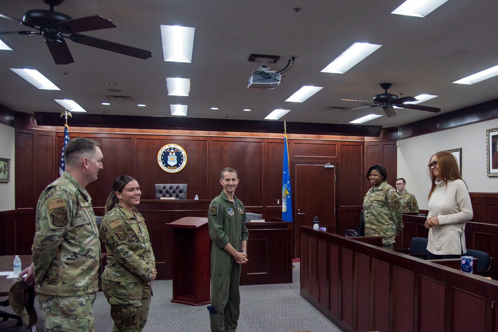 U.S. Air Force Col. Michael Richard, 35th Fighter Wing commander, greets members from the 35th FW Judge Advocate during a Wild Weasel Walk-through at Misawa Air Base, Japan, Nov. 2, 2023.