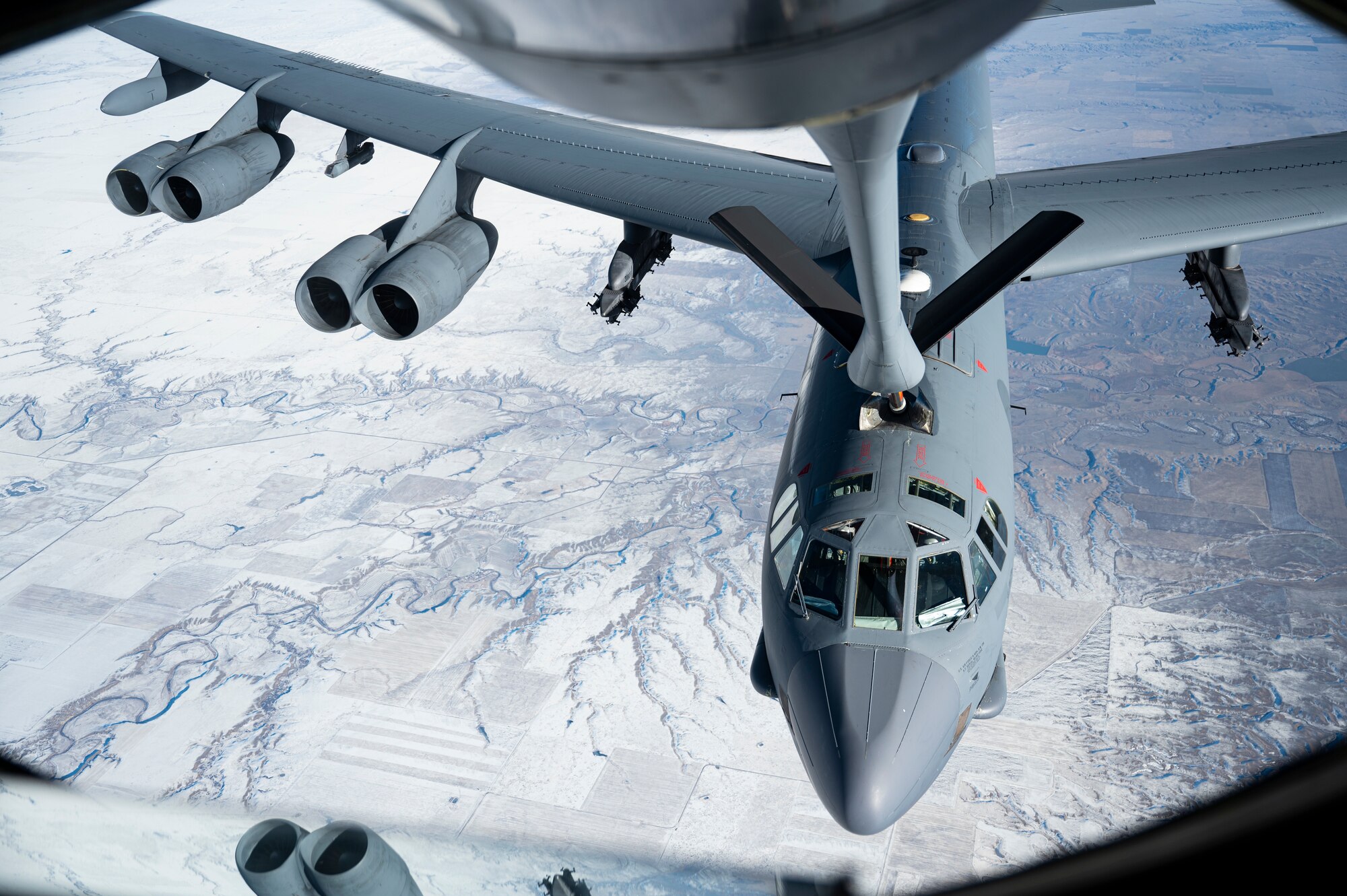 A KC-135 Stratotanker refuels a B-52 Stratofortress