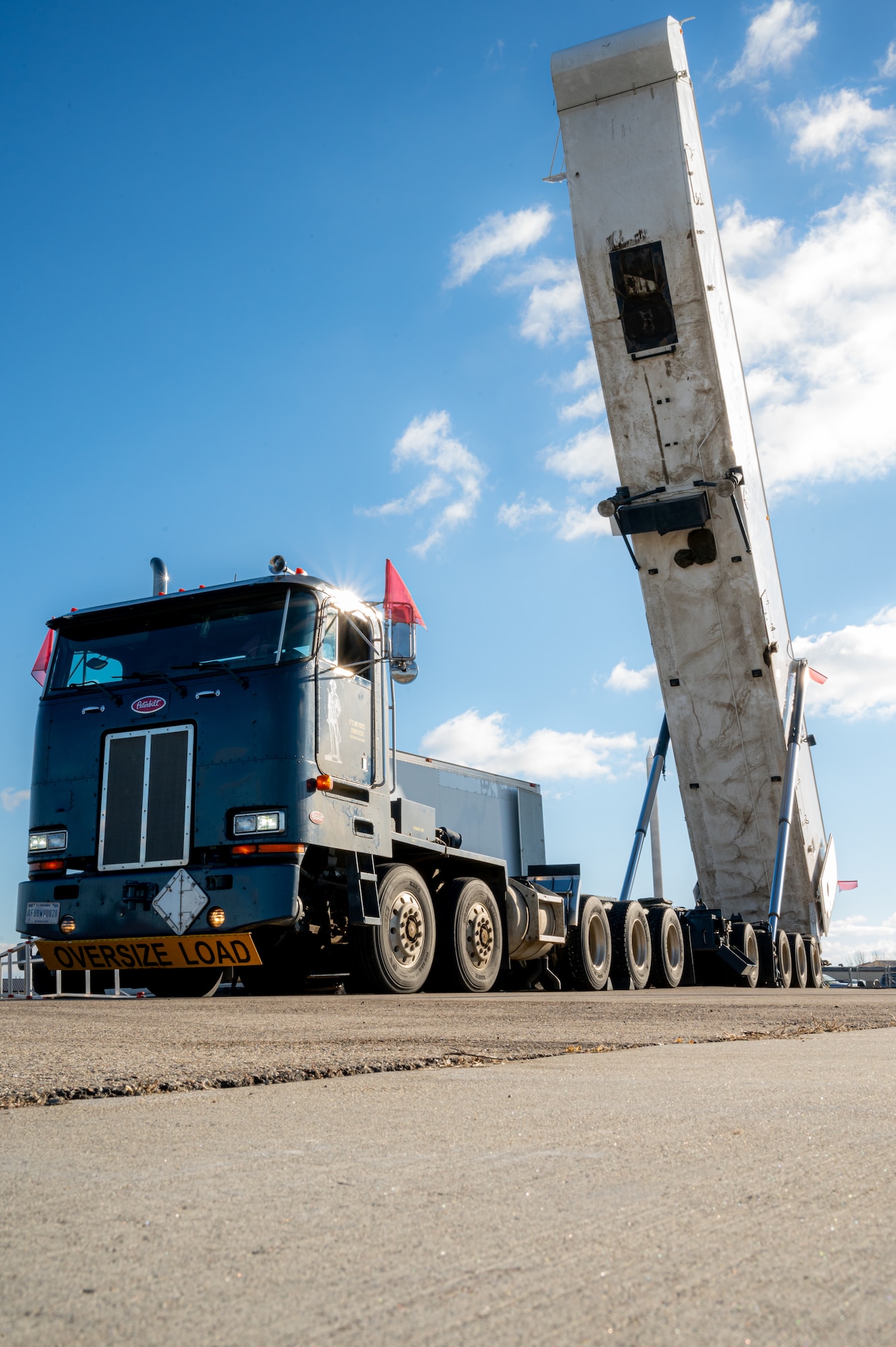 A Transporter Erector retracts during a training exercise at Minot Air Force Base, North Dakota, Nov. 16, 2023. The Transporter Erector is used to lower the Minute Man III, into one of many missile silos around Minot AFB’s area of responsibility. (U.S. Air Force photo by Airman 1st Class Alexander Nottingham)