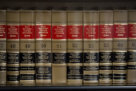 Close-up of legal books (bound copies of the United States Court of Appeals for the Armed Forces Court Rules) on a bookshelf. The Air Force Judge Advocate General's School is located at Maxwell Air Force Base and provides instruction to new judge advocates and paralegals, in addition to offering continuing legal education courses. The school also publishes scholarly legal journals semiannually and quarterly. (US Air Force Photo by Donna L. Burnett/Released)
