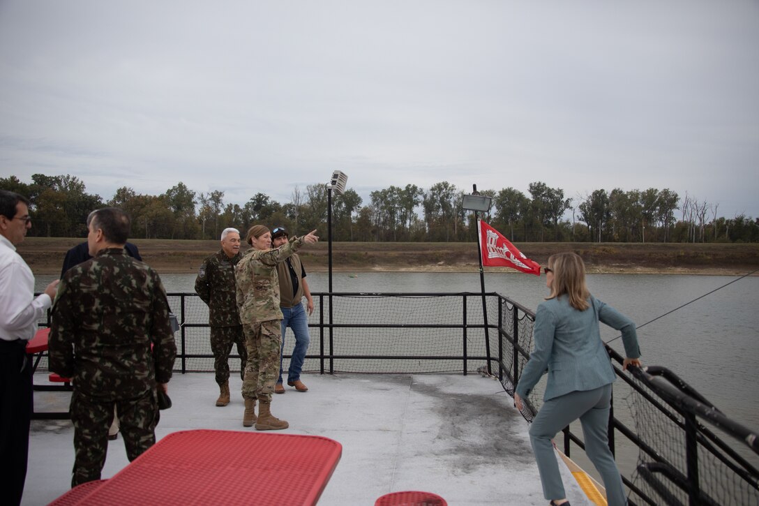 People standing on Corps vessel