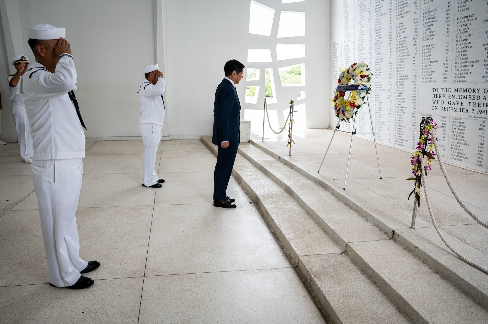 Philippine President Ferdinand R. Marcos Jr. pays his respects during a wreath-laying ceremony at the USS Arizona Memorial in Pearl Harbor, Hawaii, Nov. 19, 2023. The visit to U.S. Indo-Pacific command headquarters in Honolulu included exchanges on regional security and mutual partnership, further developing the strong democratic, economic and strategic partnership with the Philippines codified in the 1951 U.S.-Philippines Mutual Defense Treaty. USINDOPACOM is committed to enhancing stability in the Indo-Pacific region by promoting security cooperation, encouraging peaceful development, responding to contingencies, deterring aggression and, when necessary, fighting to win. (U.S. Navy photo by Chief Mass Communication Shannon Smith)