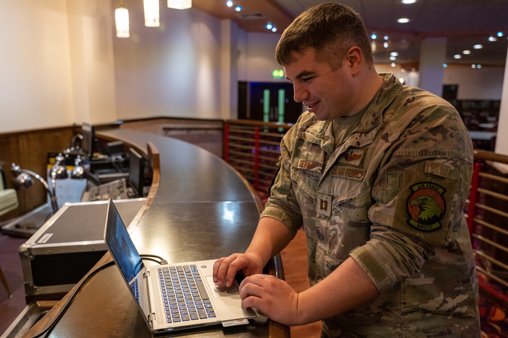 U.S. Air Force Capt. Benjamin Dewar, 351st Air Refueling Squadron KC-135 Stratotanker pilot, prepares a slideshow during the European Tanker Symposium at Royal Air Force Mildenhall, England, Nov. 16, 2023.