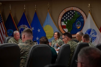 U.S. NAVAL BASE GUAM (Nov. 20, 2023) – Chief of Naval Operations Adm. Lisa Franchetti and Master Chief Petty Officer of the Navy James Honea meet with leadership from Joint Region Marianas while visiting Naval Base Guam, Nov. 20. Franchetti and Honea visited Naval Base Guam to engage with Sailors and Navy leadership to highlight Franchetti's priority of strengthening the Navy team. (U.S. Navy photo by Chief Mass Communication Specialist Amanda R. Gray)