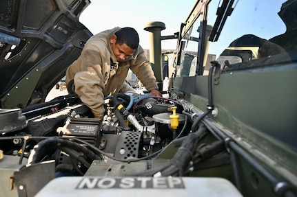 Dozens of wheeled vehicle mechanics (91B) keep tactical vehicles operational at the District of Columbia National Guard’s Combined Support Maintenance Shop at Joint Base Anacostia-Bolling (JBAB), Oct. 21, 2023. Four maintenance shops ensure mechanics are technically sound in maintenance and recovery to fulfill mission requirements. Vehicles include Medium Tactical Vehicles (MTV), Light Medium Tactical Vehicles (LMTV), High Mobility Multipurpose Wheeled Vehicles (HMMWV), and Mine Resistant Ambush Protected All-Terrain Vehicles (M-ATV). (U.S. Air National Guard photo by Master Sgt. Arthur Wright)