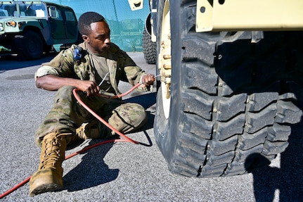 Dozens of wheeled vehicle mechanics (91B) keep tactical vehicles operational at the District of Columbia National Guard’s Combined Support Maintenance Shop at Joint Base Anacostia-Bolling (JBAB), Oct. 21, 2023. Four maintenance shops ensure mechanics are technically sound in maintenance and recovery to fulfill mission requirements. Vehicles include Medium Tactical Vehicles (MTV), Light Medium Tactical Vehicles (LMTV), High Mobility Multipurpose Wheeled Vehicles (HMMWV), and Mine Resistant Ambush Protected All-Terrain Vehicles (M-ATV). (U.S. Air National Guard photo by Master Sgt. Arthur Wright)