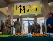 U.S. Air Force Col. Daniel Hoadley, 5th Bomb Wing commander, gives remarks at the grand opening of Myers Market at Minot Air Force Base, North Dakota, Nov. 15, 2023. Myers Market gives Airmen living in the dorms access to more food and beverage options 24/7. During the event free samples of snacks that Myers Market provides were given to those who attended. (U.S. Air Force photo by Airman 1st Class Luis Gomez)