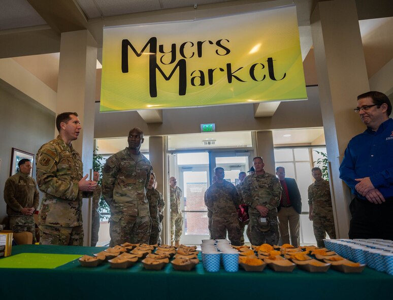 U.S. Air Force Col. Daniel Hoadley, 5th Bomb Wing commander, gives remarks at the grand opening of Myers Market at Minot Air Force Base, North Dakota, Nov. 15, 2023. Myers Market gives Airmen living in the dorms access to more food and beverage options 24/7. During the event free samples of snacks that Myers Market provides were given to those who attended. (U.S. Air Force photo by Airman 1st Class Luis Gomez)
