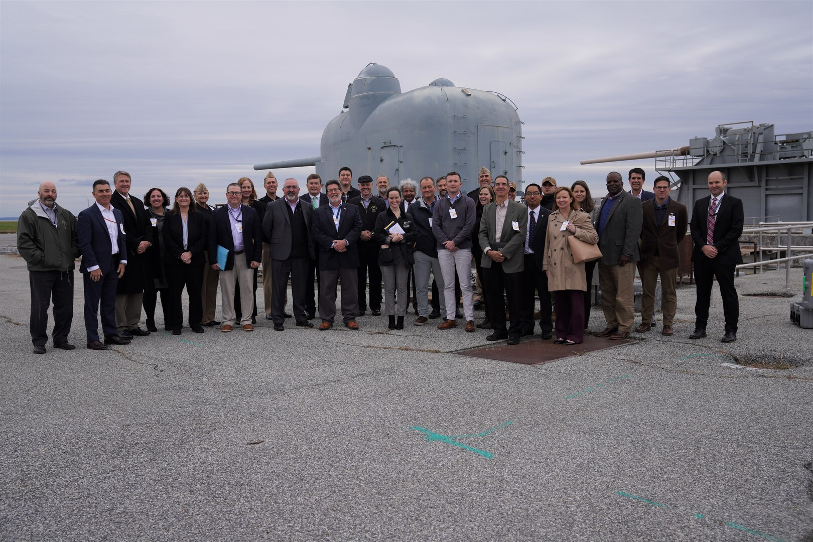 IMAGE: A large group of distinguished guests who attended the Dahlgren Proving Ground Advanced Capability Demonstration Event Oct. 31 at Naval Surface Warfare Center Dahlgren Division stand for a photo at the Potomac River Test Range.
