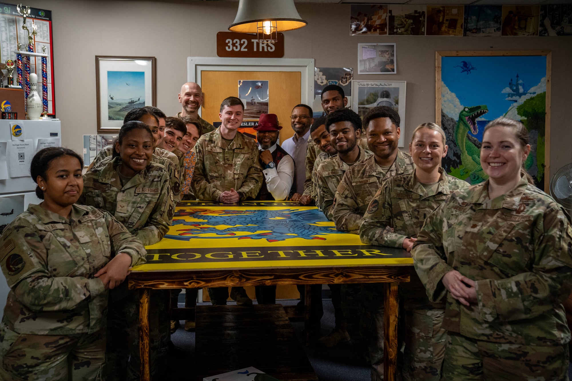 U.S. Air Force Staff Sgt. Darren Weeks, 81st Communications Squadron client systems supervisor, poses with Airmen from the 81st CS at Keesler Air Force Base, Mississippi, Nov. 7, 2023.