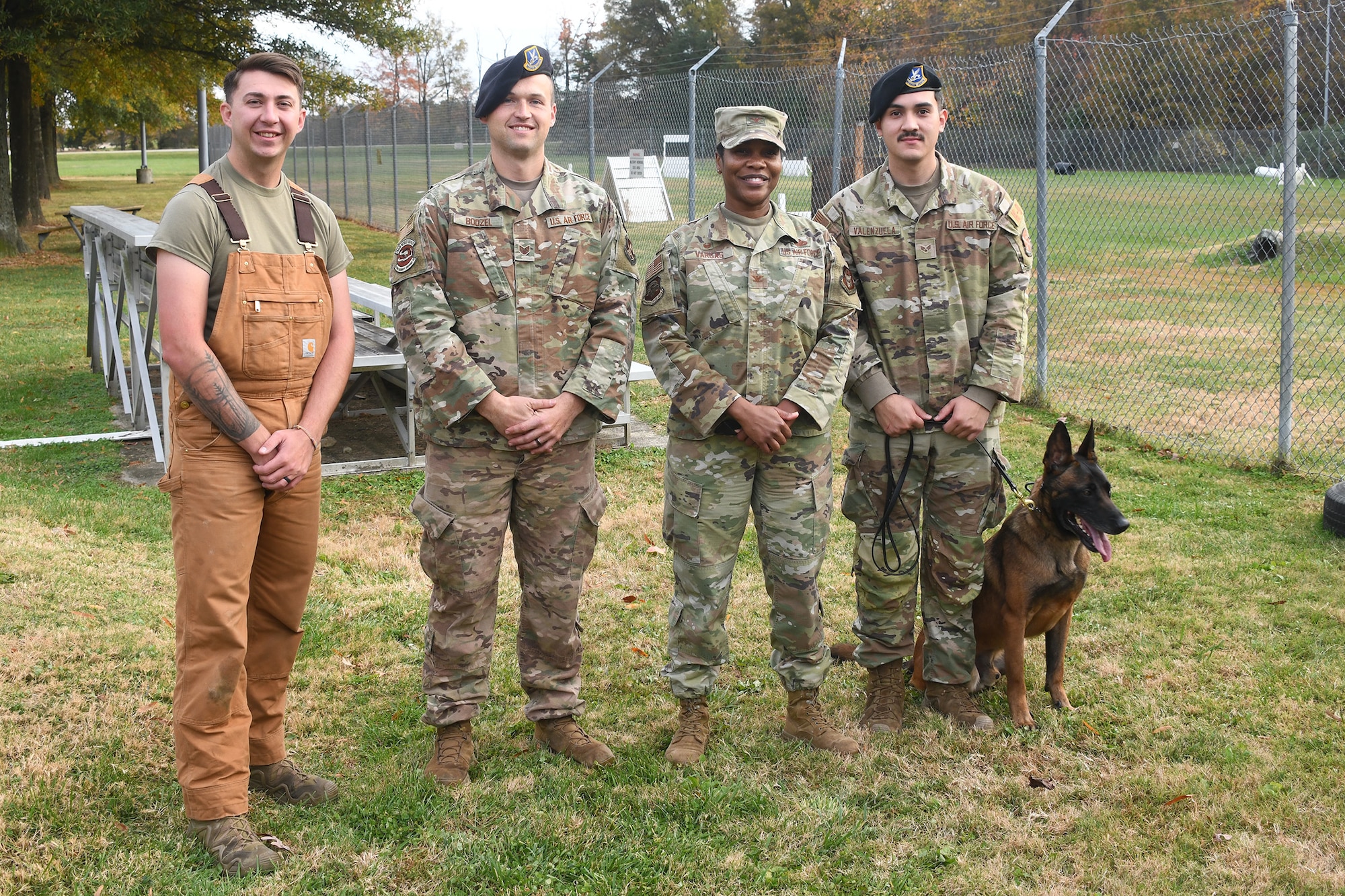 The 459th Mission Support Group Commander, Col. Vianesa Vargas, recently participated in a rite of passage for new MSG commanders with security forces under their command. She suited up in padded gear to face off against one of Joint Base Andrews' finest Military Working Dogs, 'Boss', on Nov. 15, 2023. Boss got to treat the colonel as a suspect and he apprehended her successfully on each encounter. This was an opportunity to familiarize herself with the type of training that is essential to the development and success of security forces Airmen and the JBA Working Dogs. (Air Force photo by Lt Col Timothy Smith)