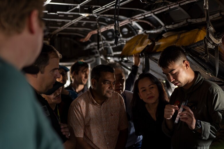 U.S. Marine Corps Capt. Akerin Lab, the digital interoperability coordinator with 3rd Marine Aircraft Wing, demonstrates Mobile User Objective System technology on a Marine Air Ground Tablet to MUOS Program Office personnel at Marine Corps Air Station Miramar, California, Nov. 16, 2023. Members of Space Systems Command and the MUOS Program Office engaged with 3rd MAW and I Marine Expeditionary Force Marines to understand end-user considerations and see MUOS used at the tactical level. MUOS elevates Marine Corps warfighting capabilities by enhancing long-range, rapid communication and expanding the operational reach of the U.S. Armed Forces. (U.S. Marine Corps Photo by Cpl. Daniel Childs)