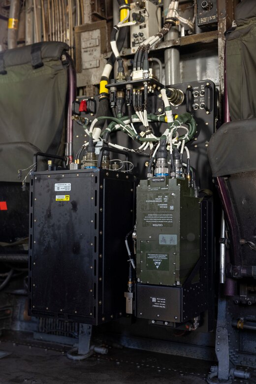 A DI-Medium message and radio waveform translator is staged on a CH-53E Super Stallion with Marine Heavy Helicopter Squadron (HMH) 361, Marine Aircraft Group 16, 3rd Marine Aircraft Wing, during a Mobile User Objective System demonstration at Marine Corps Air Station Miramar, California, Nov. 16, 2023. Members of Space Systems Command and the MUOS Program Office engaged with 3rd MAW and I Marine Expeditionary Force Marines to understand end-user considerations and see MUOS used at the tactical level. MUOS elevates Marine Corps warfighting capabilities by enhancing long-range, rapid communication and expanding the operational reach of the U.S. Armed Forces. (U.S. Marine Corps Photo by Cpl. Daniel Childs)