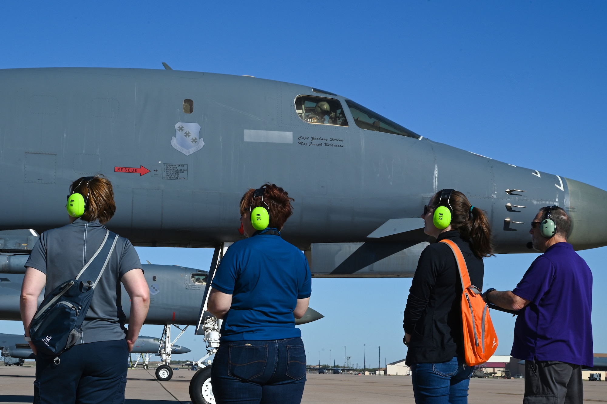 Members from the Next Generation Aircrew Protection team observe a B-1B Lancer prepare for taxi during vapor purge testing on Dyess Air Force Base, Texas, Nov. 7, 2023. This test event is the final test flight for the B-1B portion of the program before testing begins on the B-52 Stratofortress. (U.S. Air Force photo by Senior Airman Sophia Robello)
