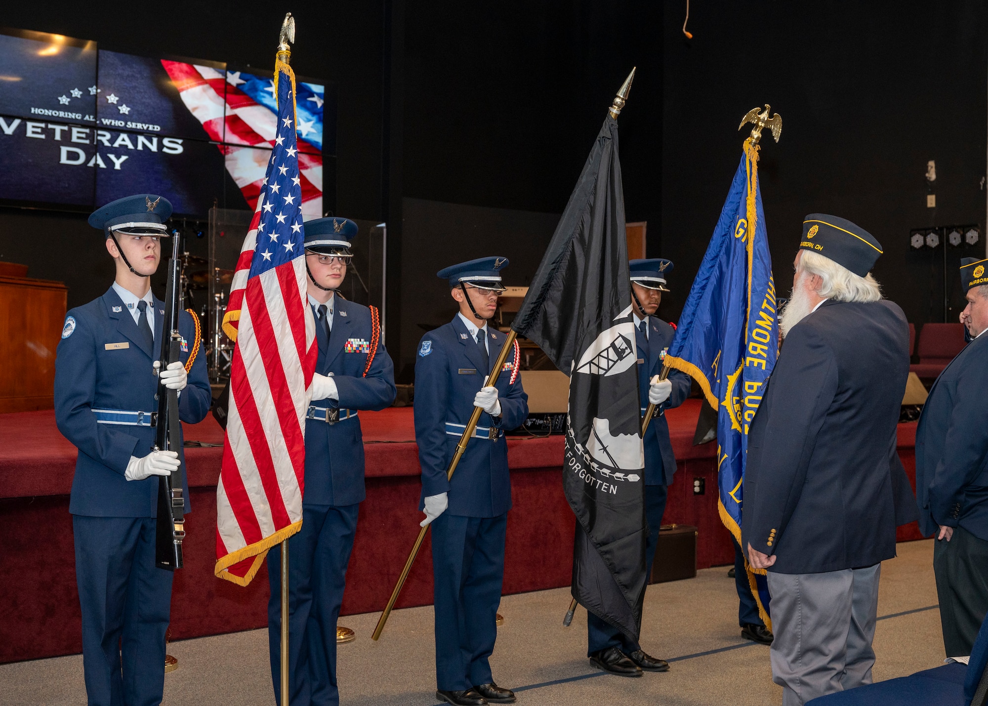 The Fairborn High School Air Force Junior Reserve Officer Training Corps presents the colors during a Veterans Day ceremony at the United Methodist Church in Fairborn, Ohio, Nov. 11, 2023. Fairborn American Legion Post 526 hosted the event. (U.S. Air Force photo by Staff Sgt. Mikaley Kline)