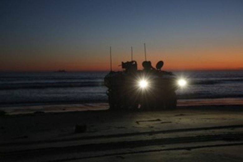 U.S. Marines assigned to the 3d Assault Amphibian Battalion, 1st Marine Division, conduct waterborne training with an Amphibious Combat Vehicle (ACV) traveling from shore to amphibious transport dock ship USS Anchorage (LPD 23) at Marine Corps Base Camp Pendleton, California.  (U.S. Marine Corps photo by Lance Cpl. Willow Marshall)