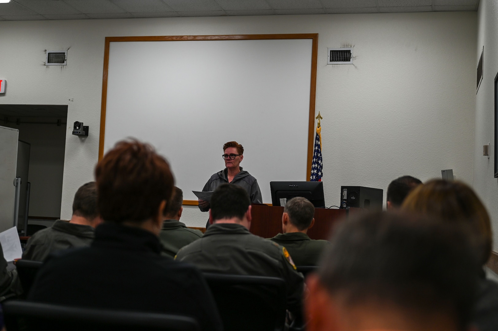 Sharon Rogers, 46th Test and Evaluation Squadron test engineer and Next Generation Aircrew Protection team member, briefs aircrew members on vapor purge test information on Dyess Air Force Base, Texas, Nov. 7, 2023. The NGAP team lays the groundwork for future chemical biological radiological and nuclear protective gear while assisting current aircrews using data collected from vapor purge testing. (U.S. Air Force photo by Senior Airman Sophia Robello)