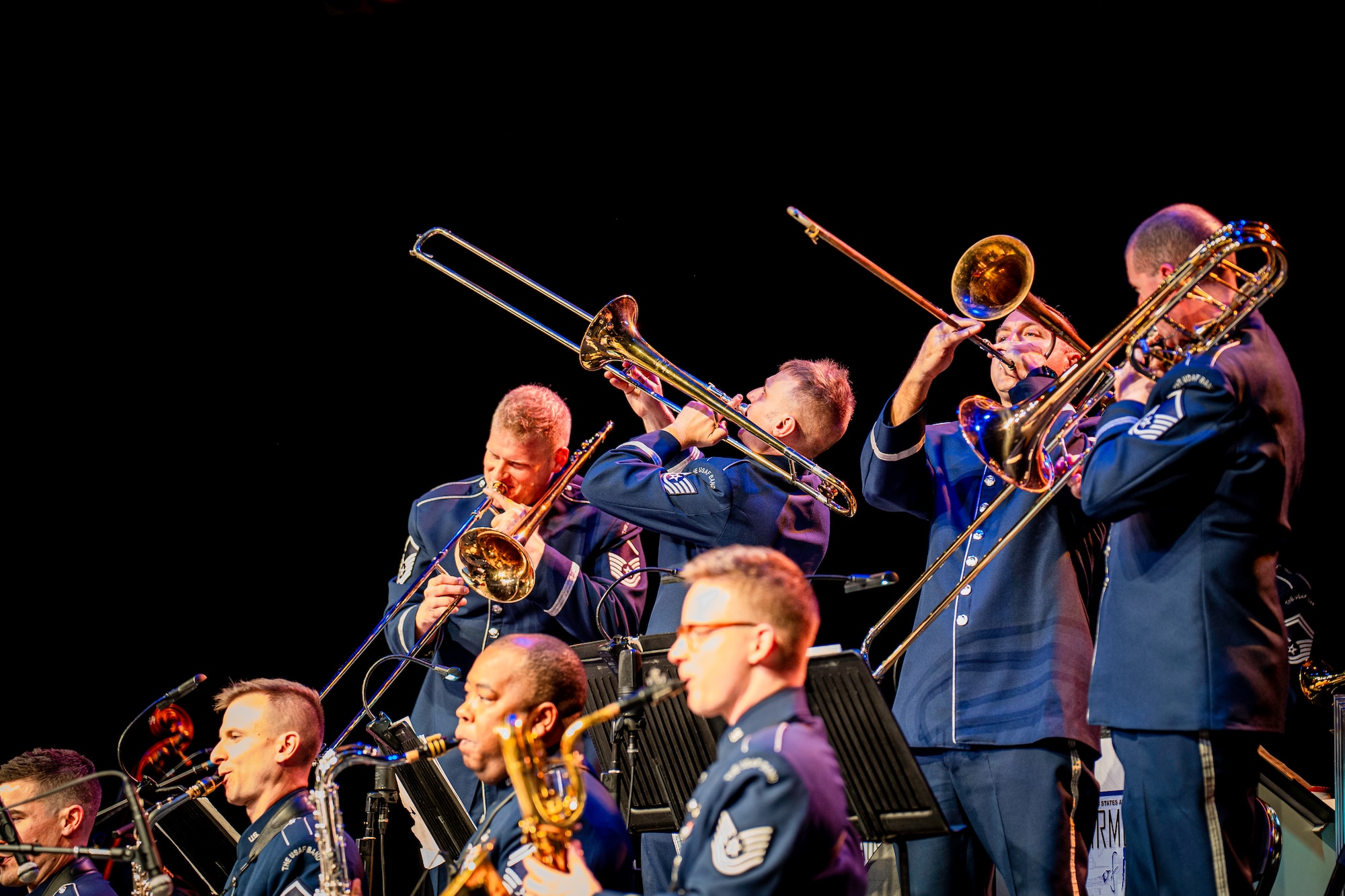 Trombone players dancing.