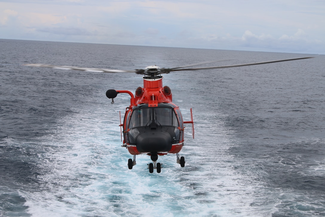 A U.S. Coast Guard Helicopter Interdiction Tactical Squadron aircrew lands on the flight deck of the Coast Guard Cutter Escanaba ((WMEC 907) during a patrol in the Eastern Pacific Ocean, Oct. 16, 2023. Escanaba’s crew disrupted illegal narcotics smuggling, interdicting 3,520 kilograms of cocaine valued at more than $102 million, which were offloaded in Port Everglades, Florida.