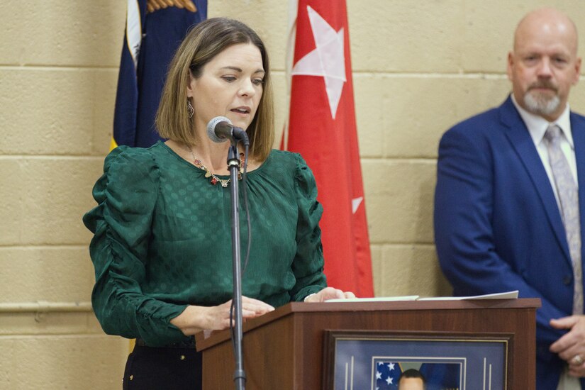 Christi Cole Pope speaks to attendees at an armory naming ceremony in Middlesboro, Kentucky, on Nov. 17, 2023.