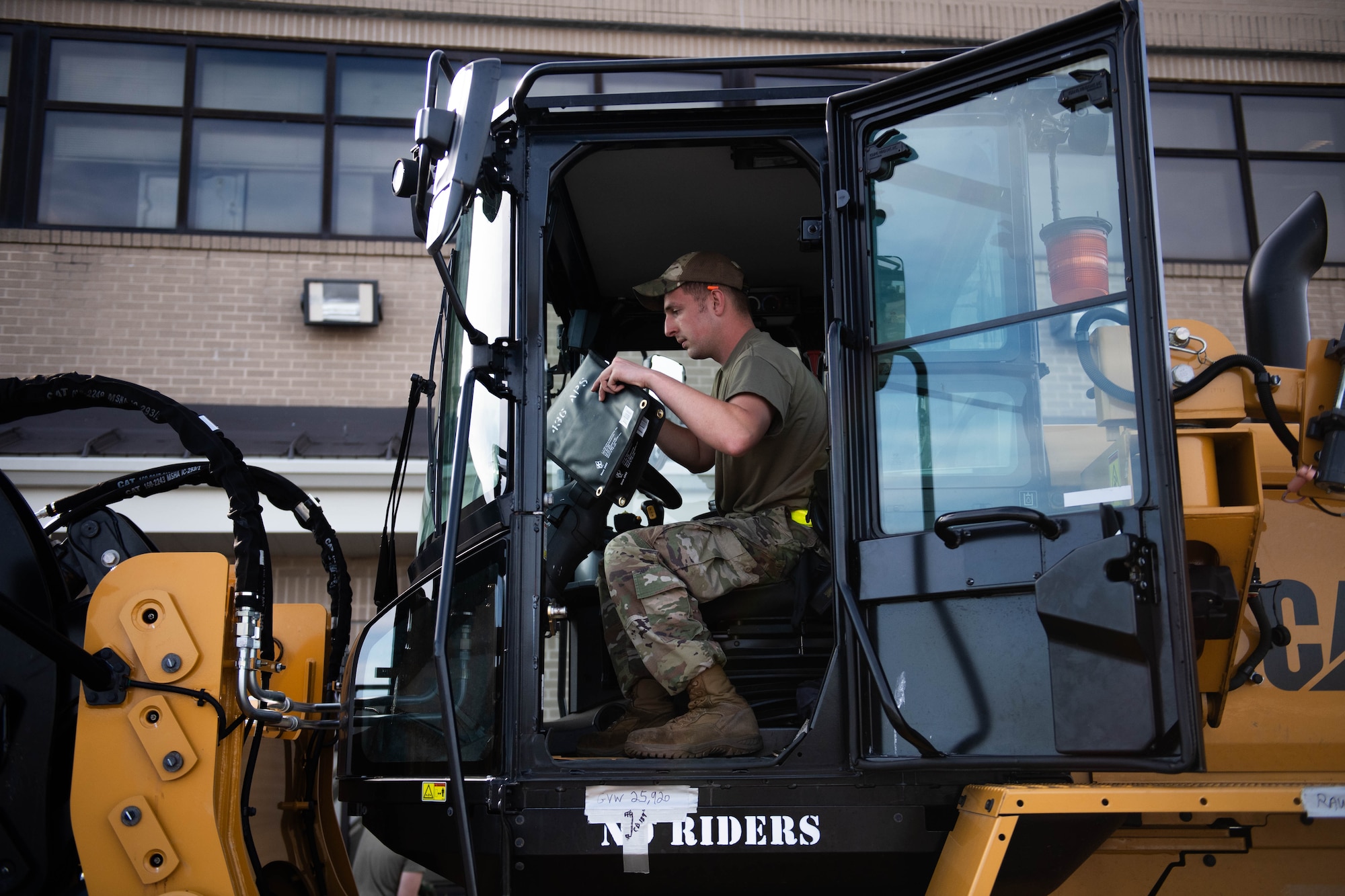 U.S. Air Force Airman 1st Class Brendan Girard, 436th Aerial Port Squadron air transportation specialist, inspects a 10K AT forklift at Dover Air Force Base, Delaware, Nov. 17, 2023. 436th APS and 436th Logistic Readiness Squadron practiced preparing the 10K AT Forklift for transportation in response to short-notice taskings. The 436th Mission Generation Group Tactics Team organized the event to strengthen points of interaction between the different squadrons within the group. (U.S. Air Force photo by Tech. Sgt. J.D. Strong II)